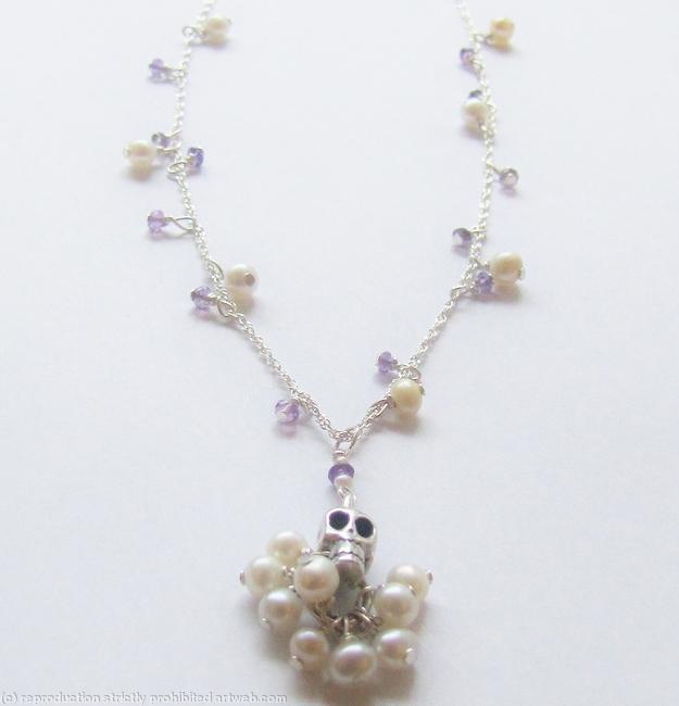 Skull on bed of pearls