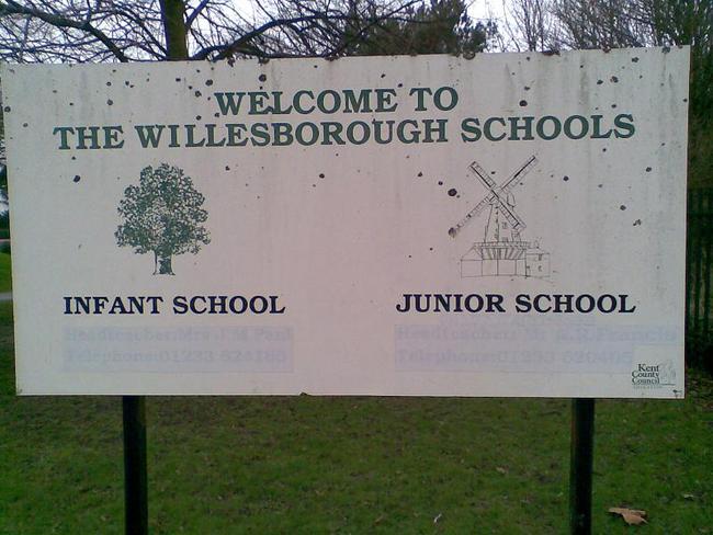 This tired sign really did need a re-paint after all its the first thing a visitor sees when entering a school