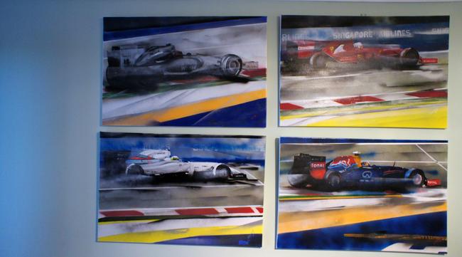 group of four individual F1 cars