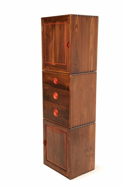 Solid Black American Walnut fully jointed cabinets showing hand cut dovetails on carcus and Drawers. All detail work and handles in rare Pink Ivory wood