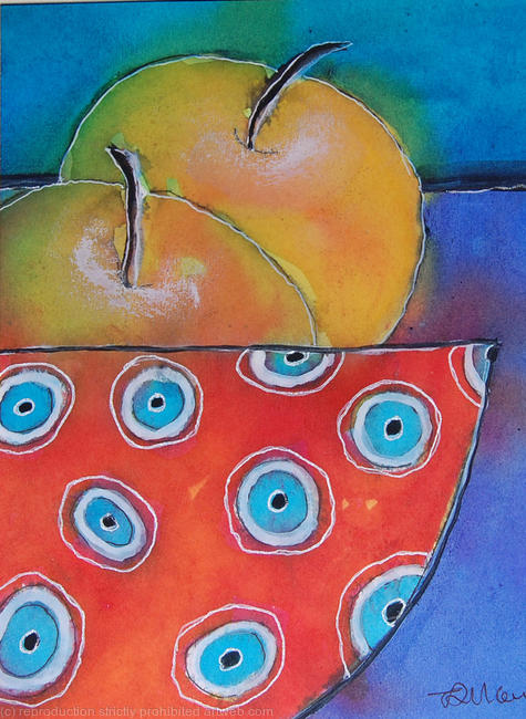 Apples in a red bowl