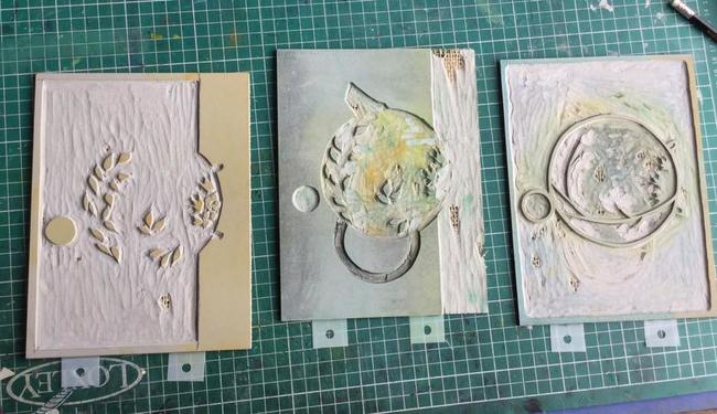 linocuts of multiblock print showing the plastic tags protruding from underneath