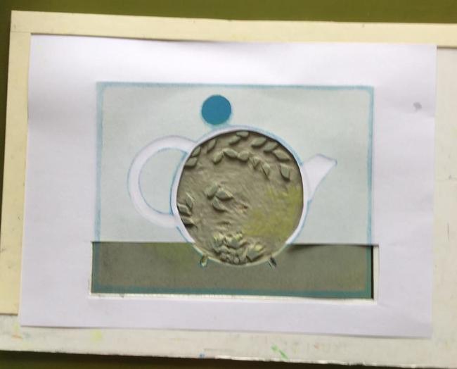 top of mountboard showing paper in registration