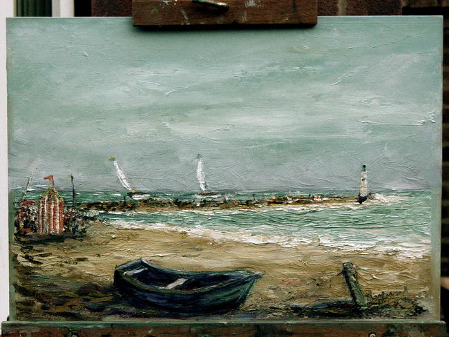 Beach with old boat.