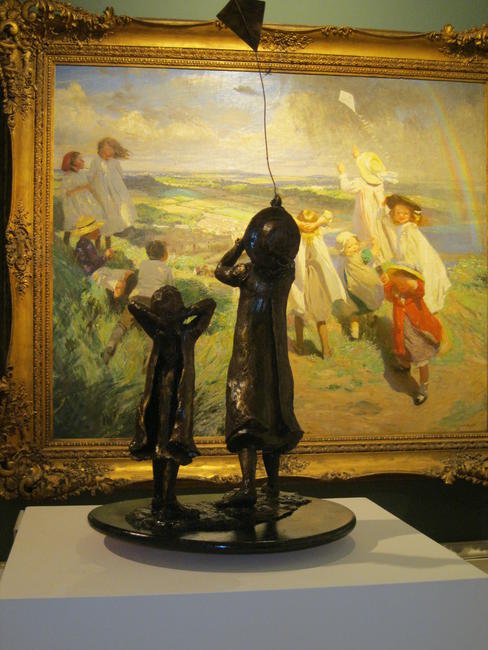 Flying the Kite- sculpture exhibited alongside Dame Laura Knight painting Flying the kite 1910 at Penlee Art Gallery, Penzance