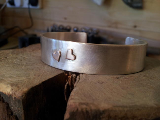 Commissioned silver bangle with rose gold