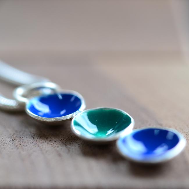 Handmade silver pod necklace with blue and green enamel
