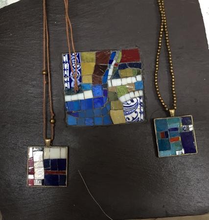 Pendants displayed on my mosaic slate