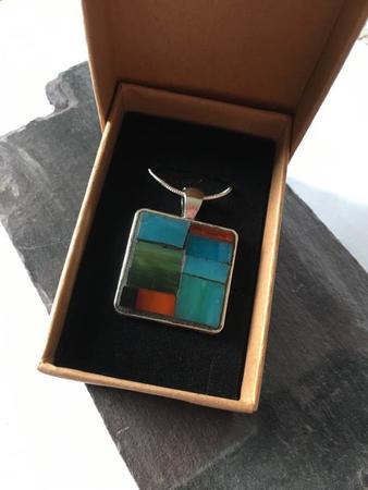 Silver alloy with stained glass