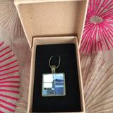 Medium sized pendant with blue and white