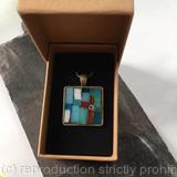 medium sized antique bronze pendant