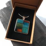 Silver alloy with stained glass