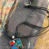 Silver tone alloy with stained glass