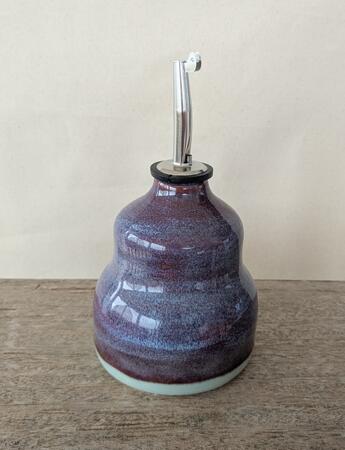 Purple Shimmer oil bottle 