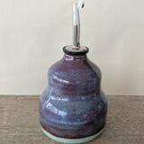 Purple Shimmer oil bottle 
