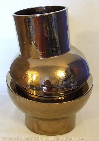 Asymmetric split orb vessel