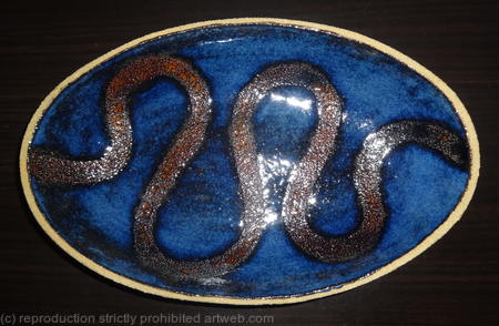 Fully glazed blue 'snake' dish
