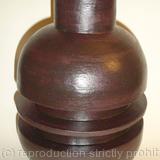 Black stoneware pot with single rib