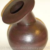 Black stoneware bottle with angled neck