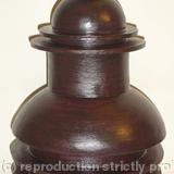 Black stoneware bottle with central rib