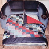 Sofa-bed with reversible quilt
