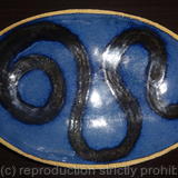 Fully glazed blue 'loop' dish
