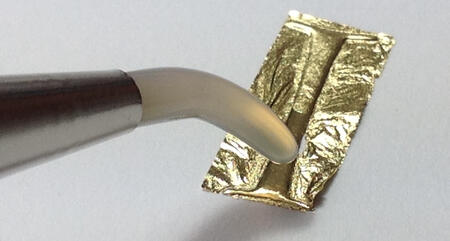 Burnishing gold leaf