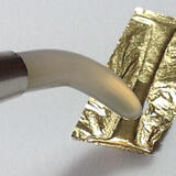 Burnishing gold leaf