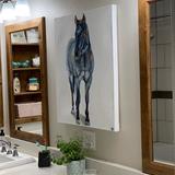 Horse painting hanging in customer's home