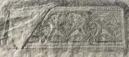 Carved pattern beneath  textile