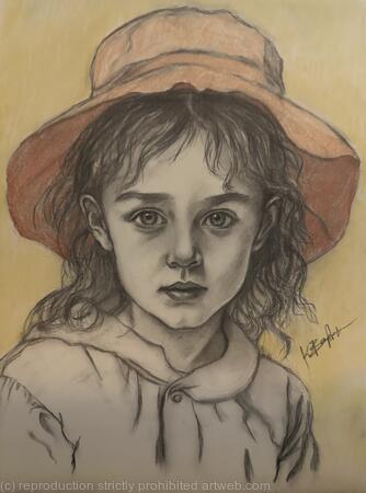 Little girl in a hat