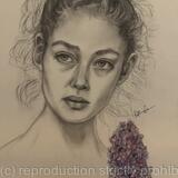 Young girl and lilacs
