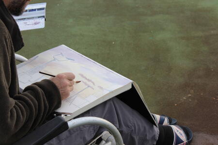 painting scientific equipment on Polarstern's  Monkey Island deck  in the late afternoon