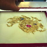 Freshly made paper cloud collage on paper making screen. Paper Studio Northumbria, Northumbria University.