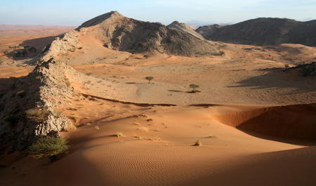 Dunes meet mountains, Jebal Sumayni, UAE/Oman