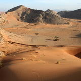 Dunes meet mountains, Jebal Sumayni, UAE/Oman
