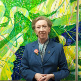 Margaret Beckett, at the opening of the Lister House surgery in Derby, stands in front of a painting by John Thompson, DANCING CRANES, which was donated to the surgery by the Warrack family in 2009