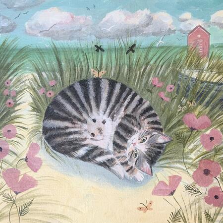 Tabby nap on the beach 