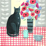 Black cat with flowers