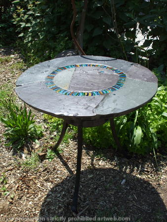 Wave Circle Design: hand made garden table on traditionally forged iron base
