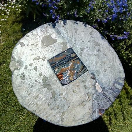 Bee Well garden table with an insect bath feature