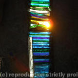 Light Blessings, Arrow-slit design stained glass window feature for exterior wall