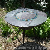 Wave Circle Design: hand made garden table on traditionally forged iron base