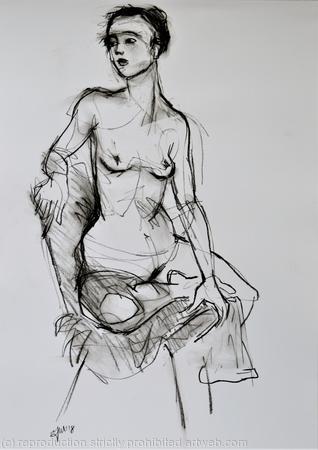 Sophie sitting one leg under