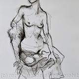 Sophie sitting one leg under