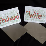 Husband or wife Christmas cards PLEASE SAY WHICH ONE. 6 by 4 inch card with silver envelope. The price via Paypal is for one card. Any relative name available.