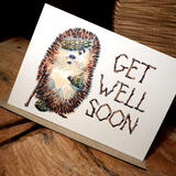 103 Skillipig with stick and bandages GET WELL SOON 6 by 4 inch greeting card.