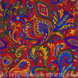 al-over design with red sopt on red b/g