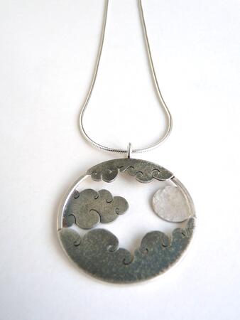Moon and cloud pendant £134