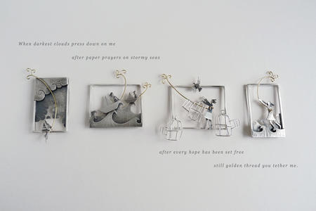 When darkest clouds press down on me, after paper prayers on stormy seas, after every hope has been set free, still golden thread you tether me